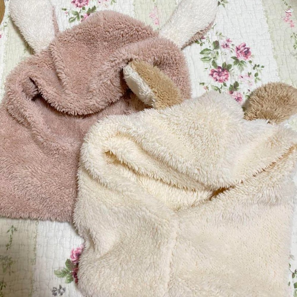 A hat and a hitch muffler